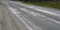 Photo: Damaged road situated in a salt affected area
