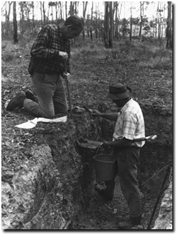 Photo: Jim Rowan in soil pit in Bendigo District - 1970's